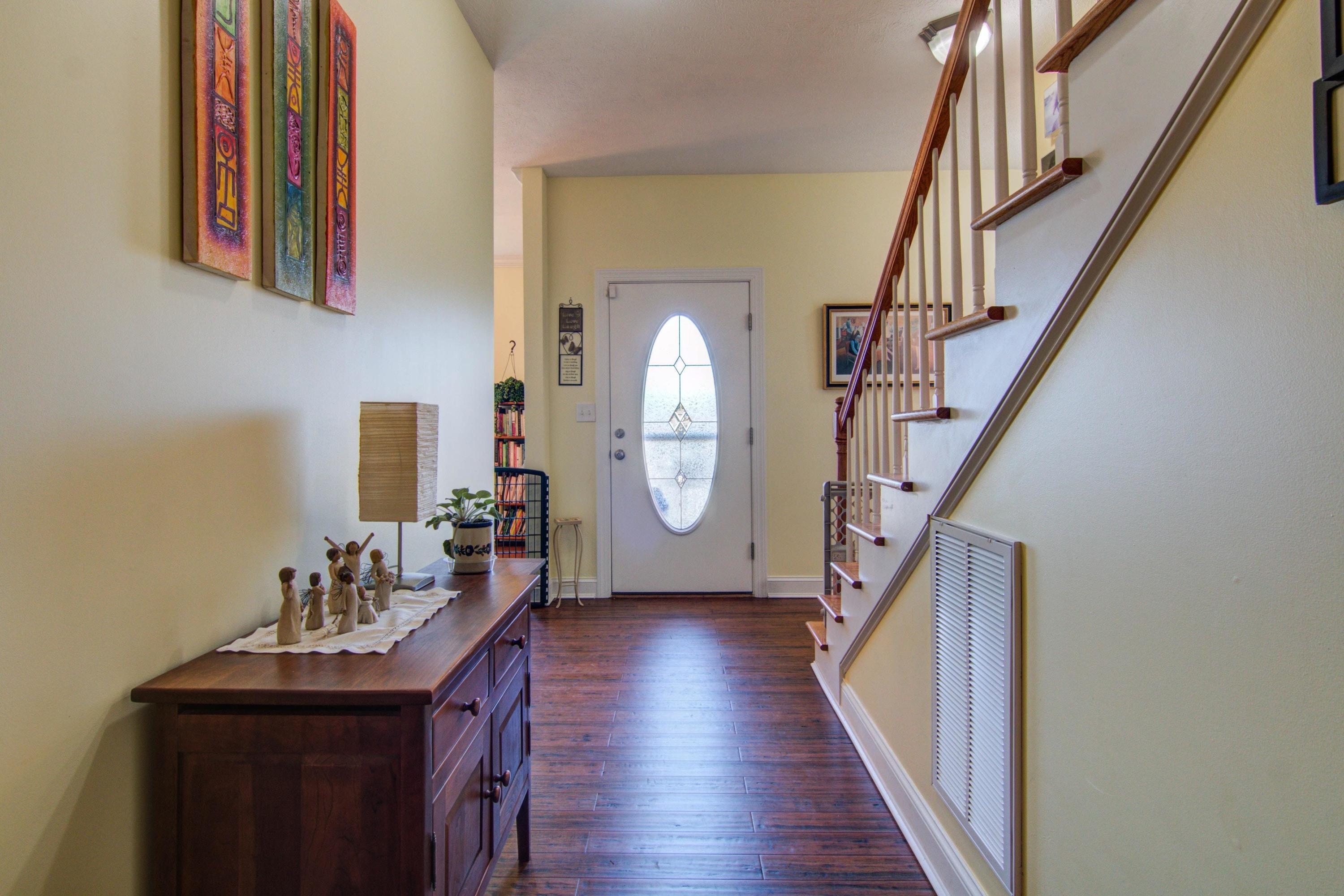 1129 Mountain View Road Vinton, VA 24179 - Photo 4 of 24 a view of a hallway with wooden floor and entryway