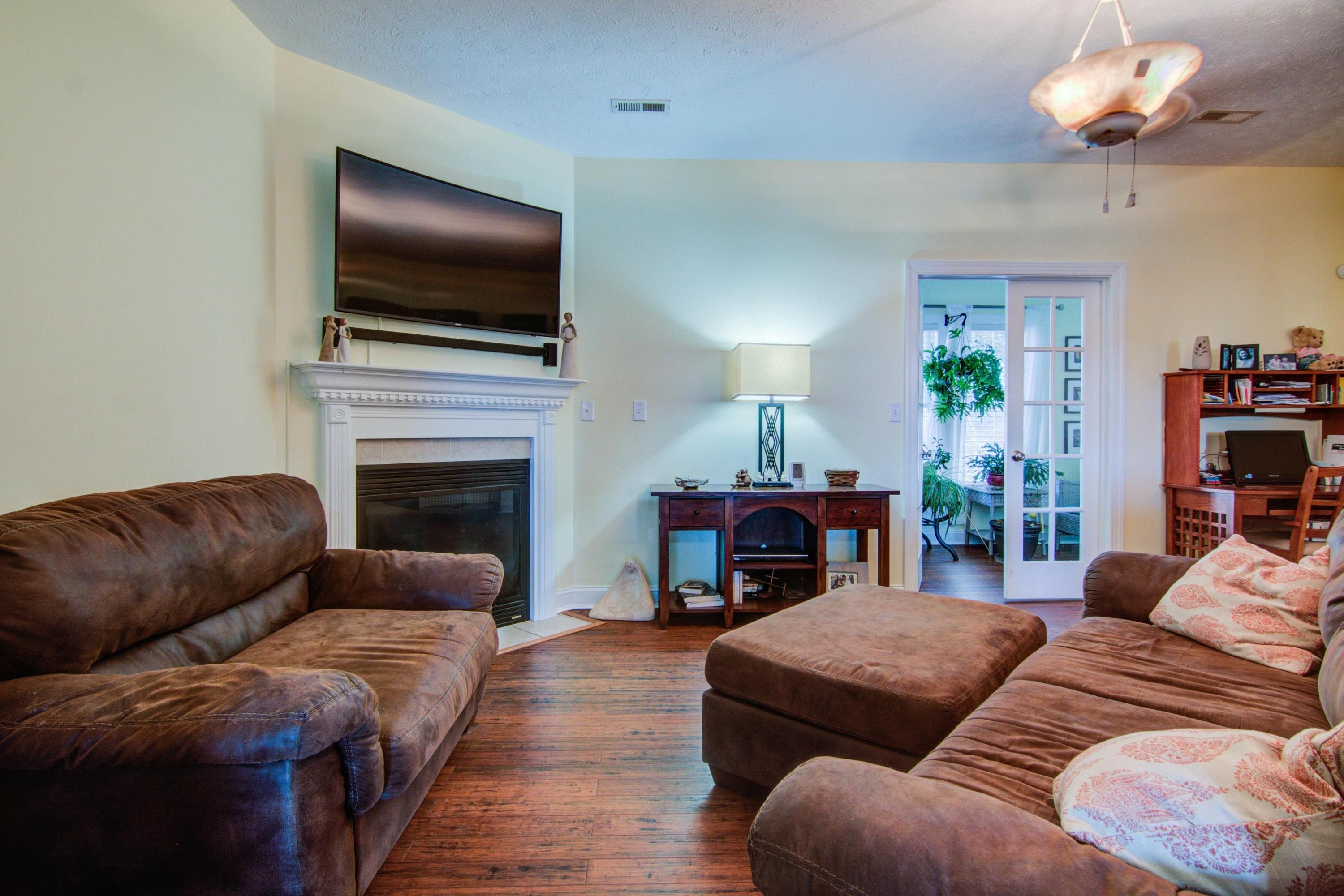 1129 Mountain View Road Vinton, VA 24179 - Photo 5 of 24 a living room with furniture a flat screen tv and a fireplace