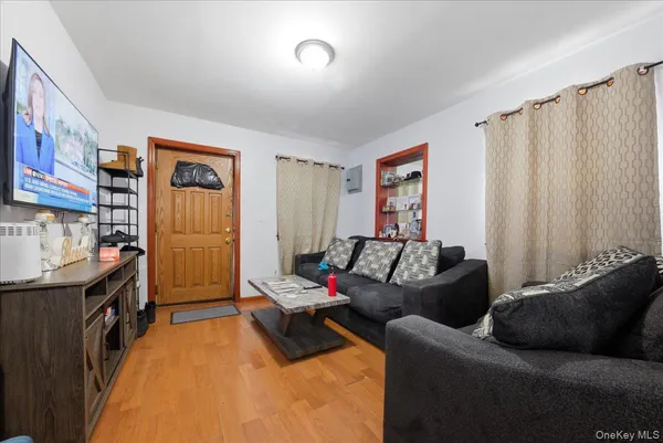 a living room with furniture and a rug