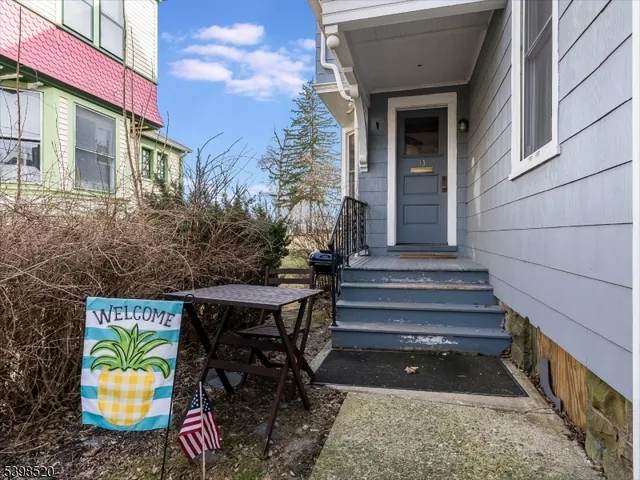 a view of house with outdoor seating space