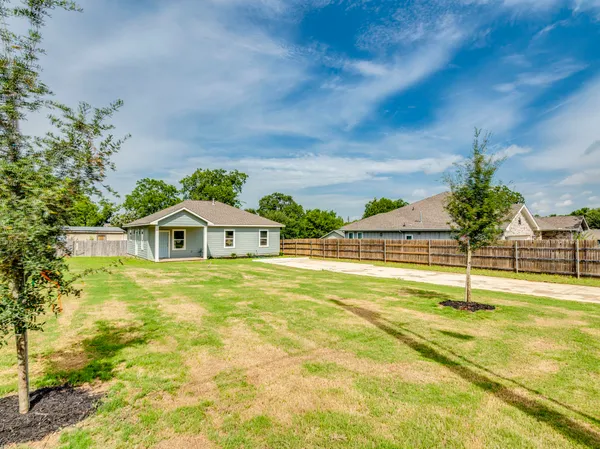 a view of a house with a swimming pool