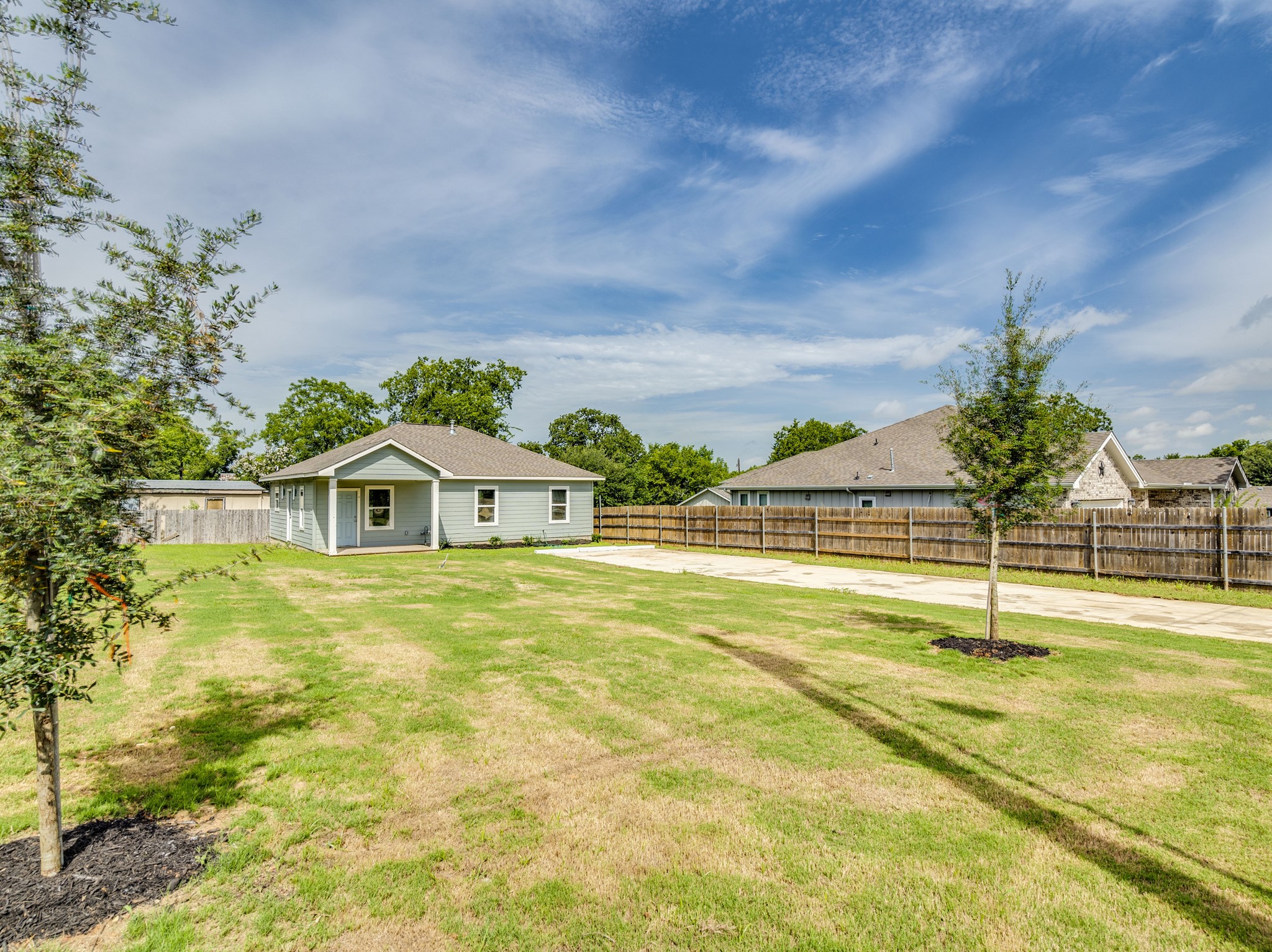 411 South Ave B Elgin, TX 78621 - Photo 2 of 23 a view of a house with a swimming pool
