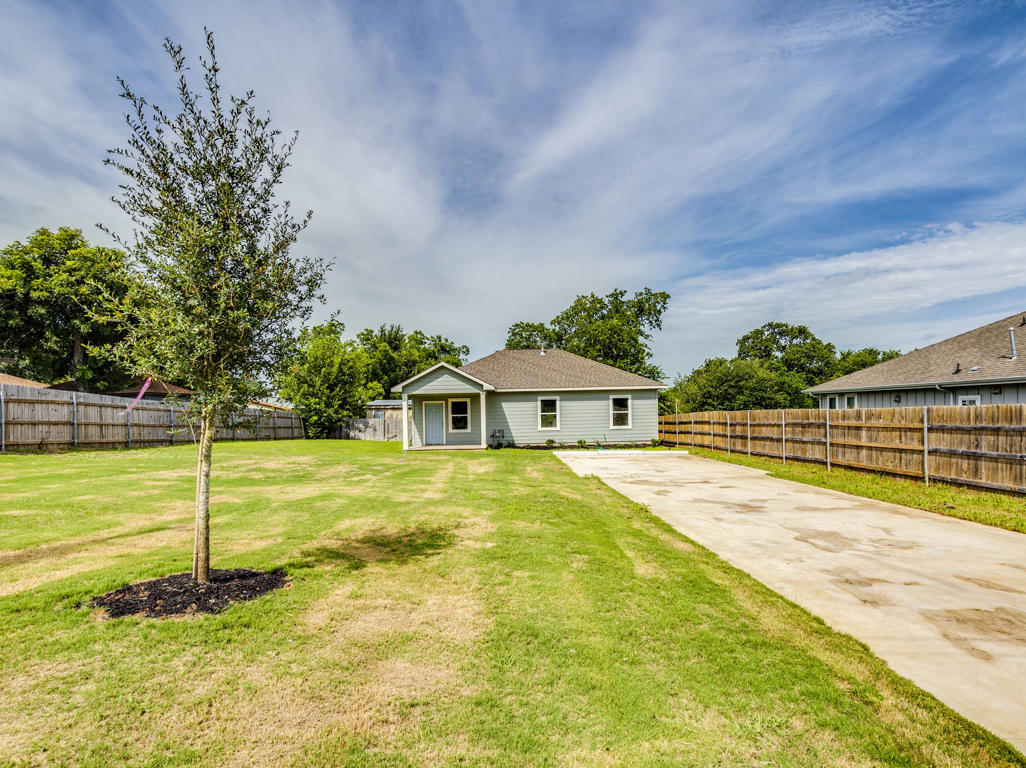 411 South Ave B Elgin, TX 78621 - Photo 23 of 23 a view of a house with a swimming pool