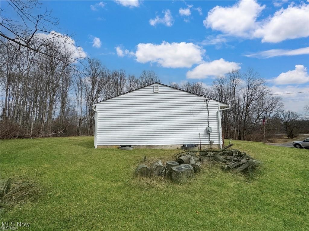 2248 Lackey Old State Road Delaware, OH 43015 - Photo 4 of 13 View of side of property with a yard