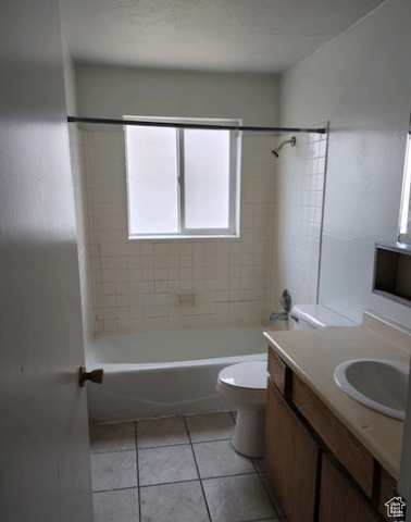 590 Pilot Avenue Wendover, UT 84083 - Photo 18 of 20 Full bath featuring vanity, shower / bath combination, and light tile patterned floors