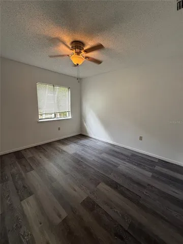 a view of a livingroom with wooden floor