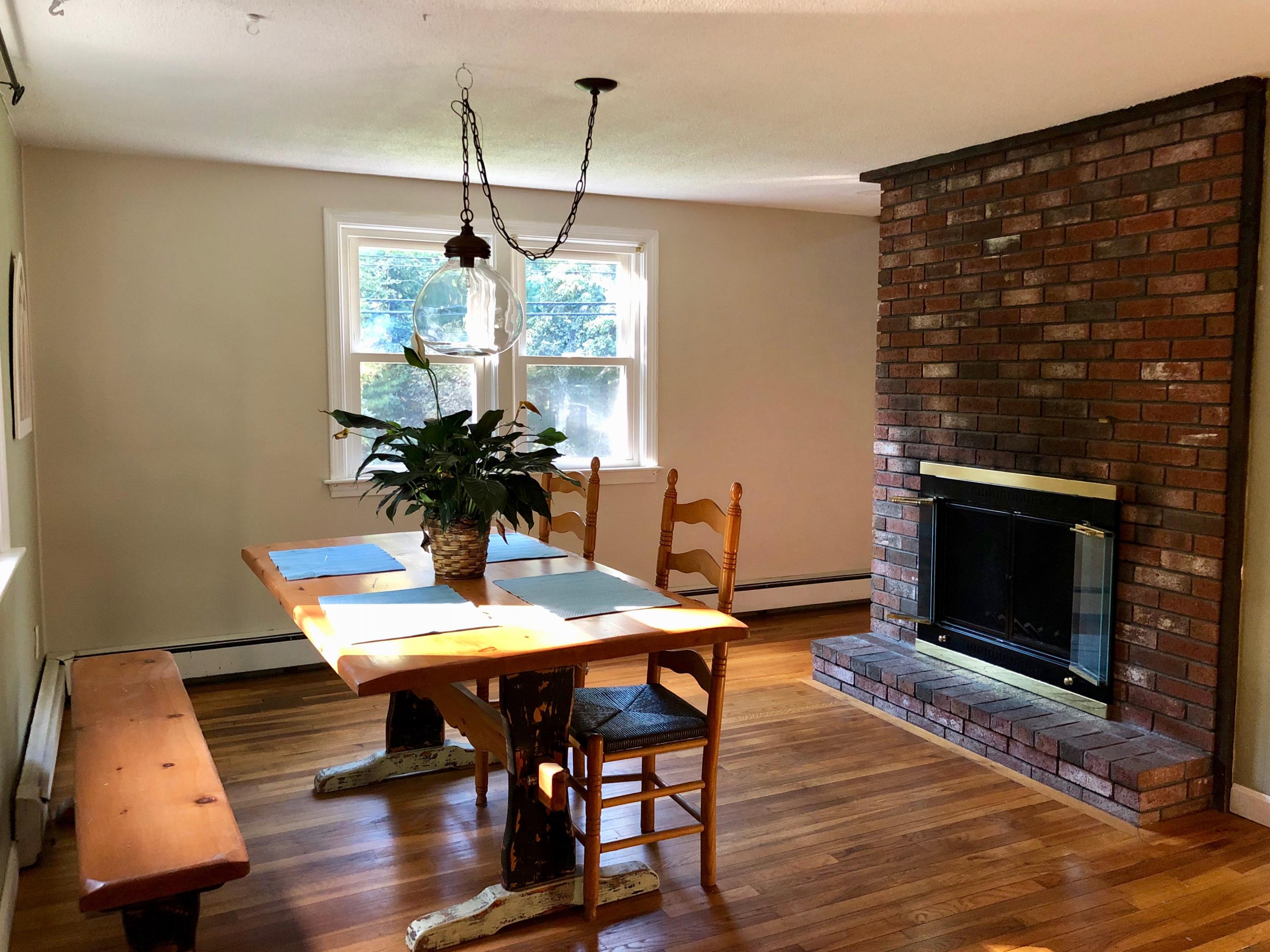 171 South Sandwich Road Mashpee, MA 02649 - Photo 9 of 24 Dining w/fireplace