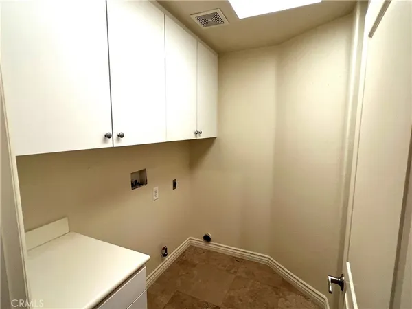 a bathroom with a sink a mirror and a toilet