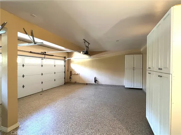 a view of a pathway of the house with yard