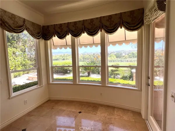 a view of a staircase and a black white door