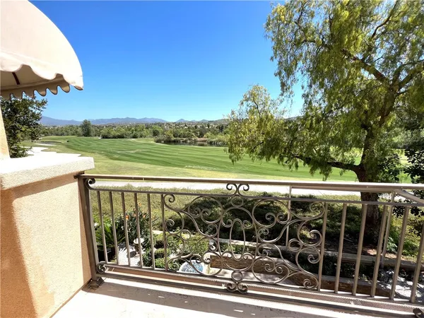 a view of an ocean and a yard