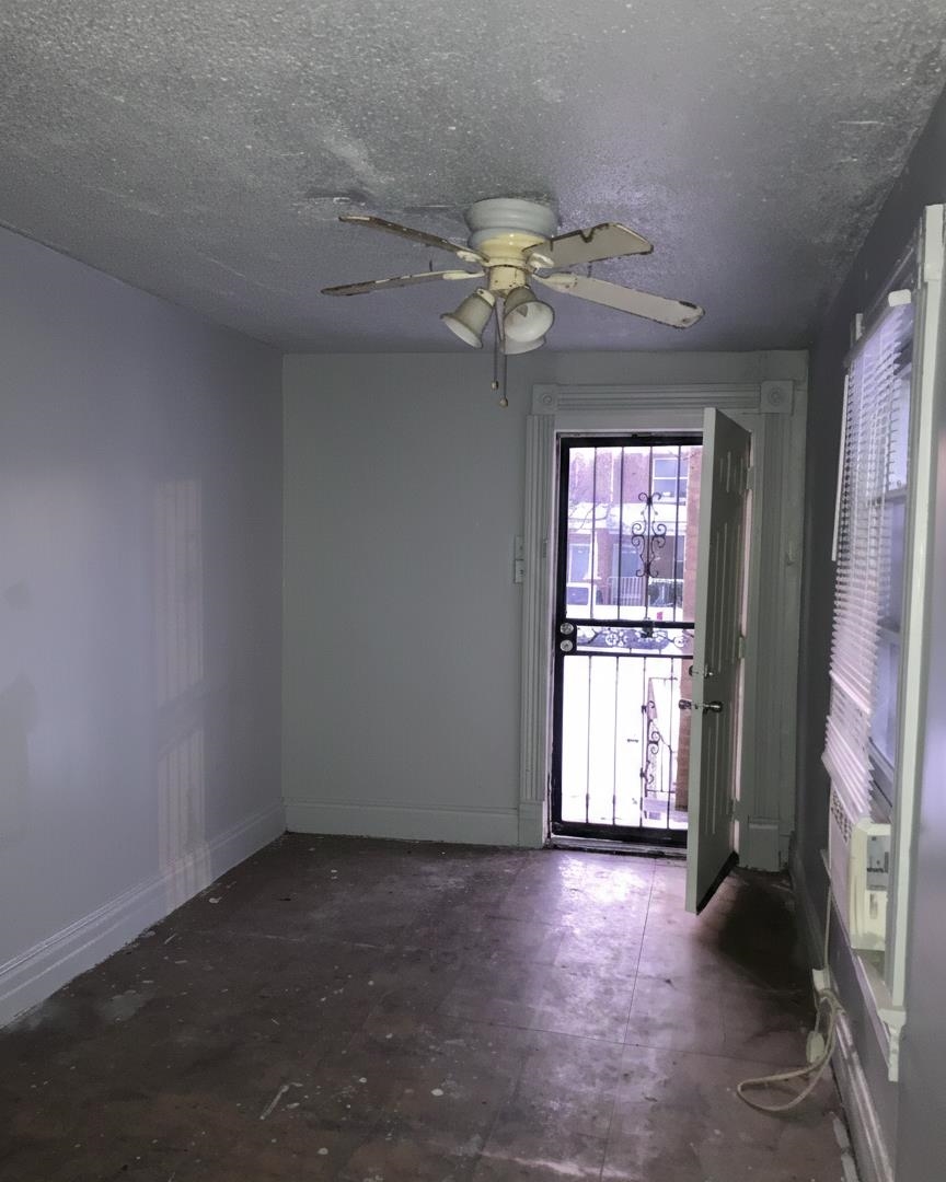 292 Decatur Street Memphis, TN 38105 - Photo 3 of 10 a view of an empty room with a window