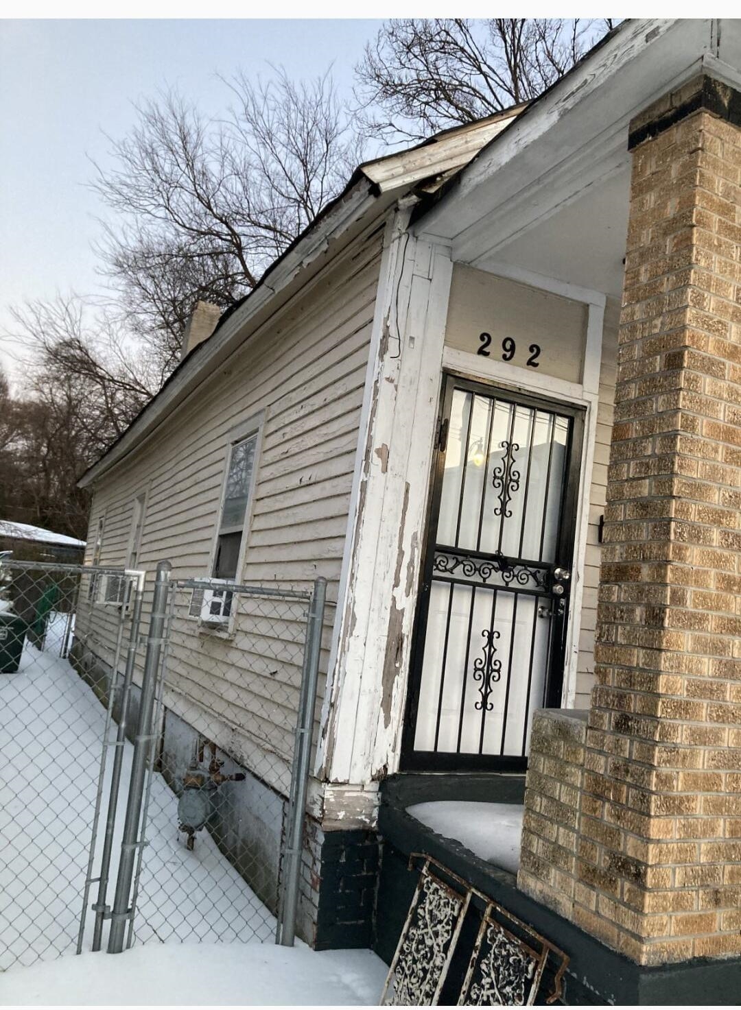 292 Decatur Street Memphis, TN 38105 - Photo 5 of 10 a view of a house with backyard and wooden fence