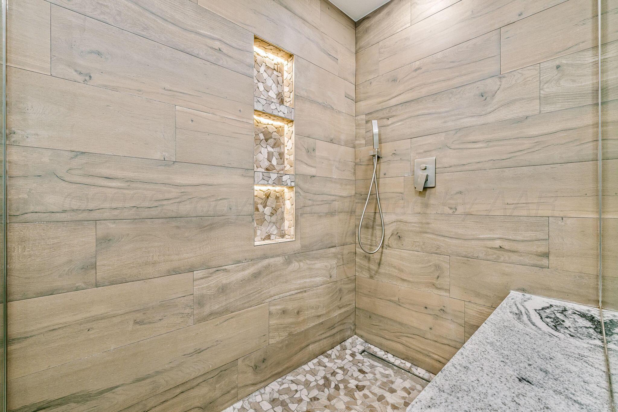 801 Arrah Friona, TX 79035 - Photo 16 of 37 a bathroom with a shower