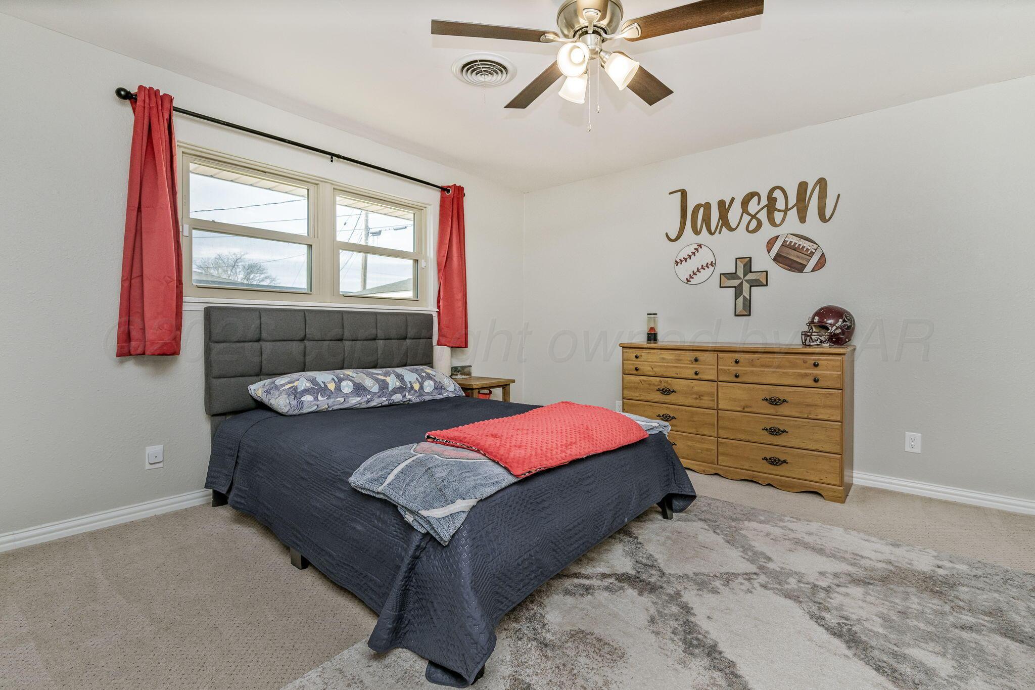 801 Arrah Friona, TX 79035 - Photo 17 of 37 a bedroom with a bed and a window