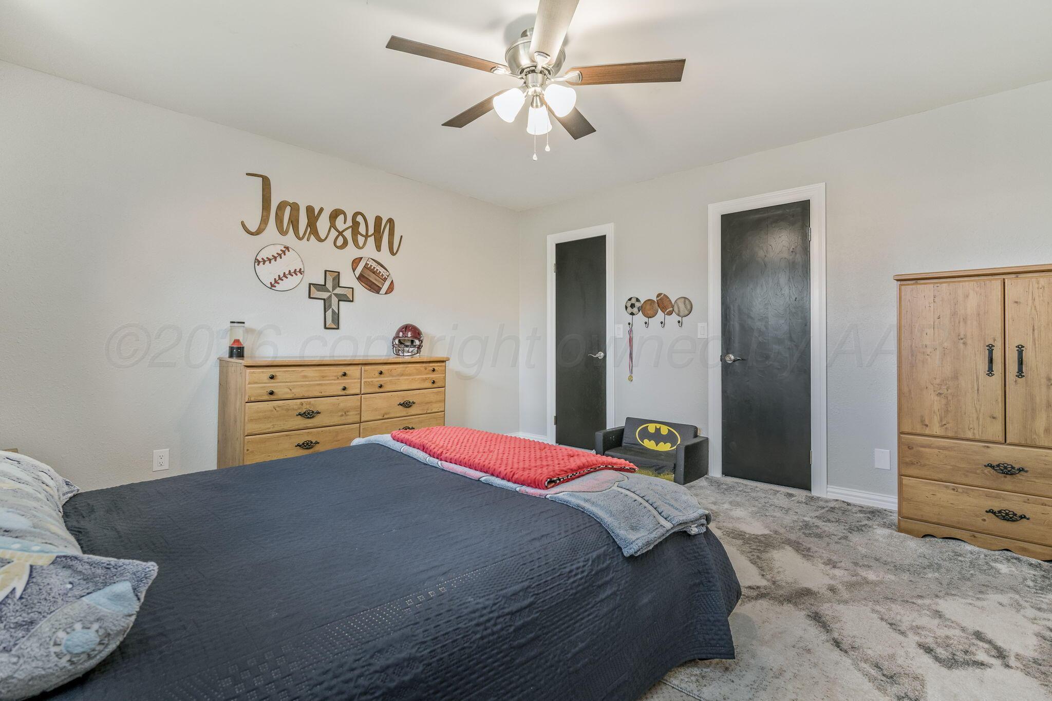 801 Arrah Friona, TX 79035 - Photo 18 of 37 a bedroom with a bed and closet