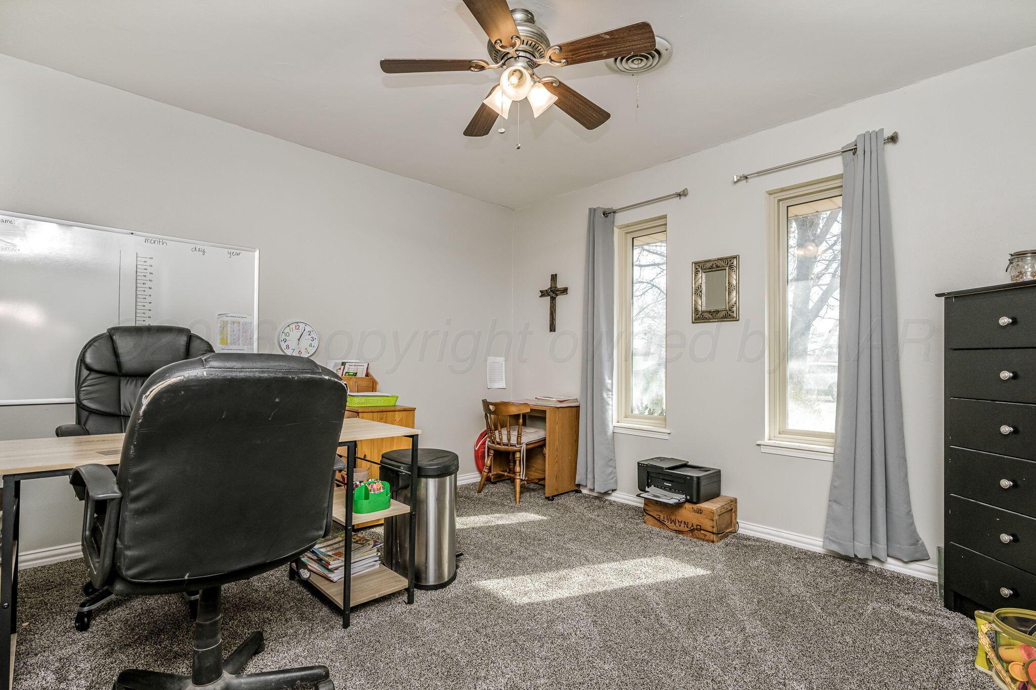 801 Arrah Friona, TX 79035 - Photo 26 of 37 a living room with furniture and a window