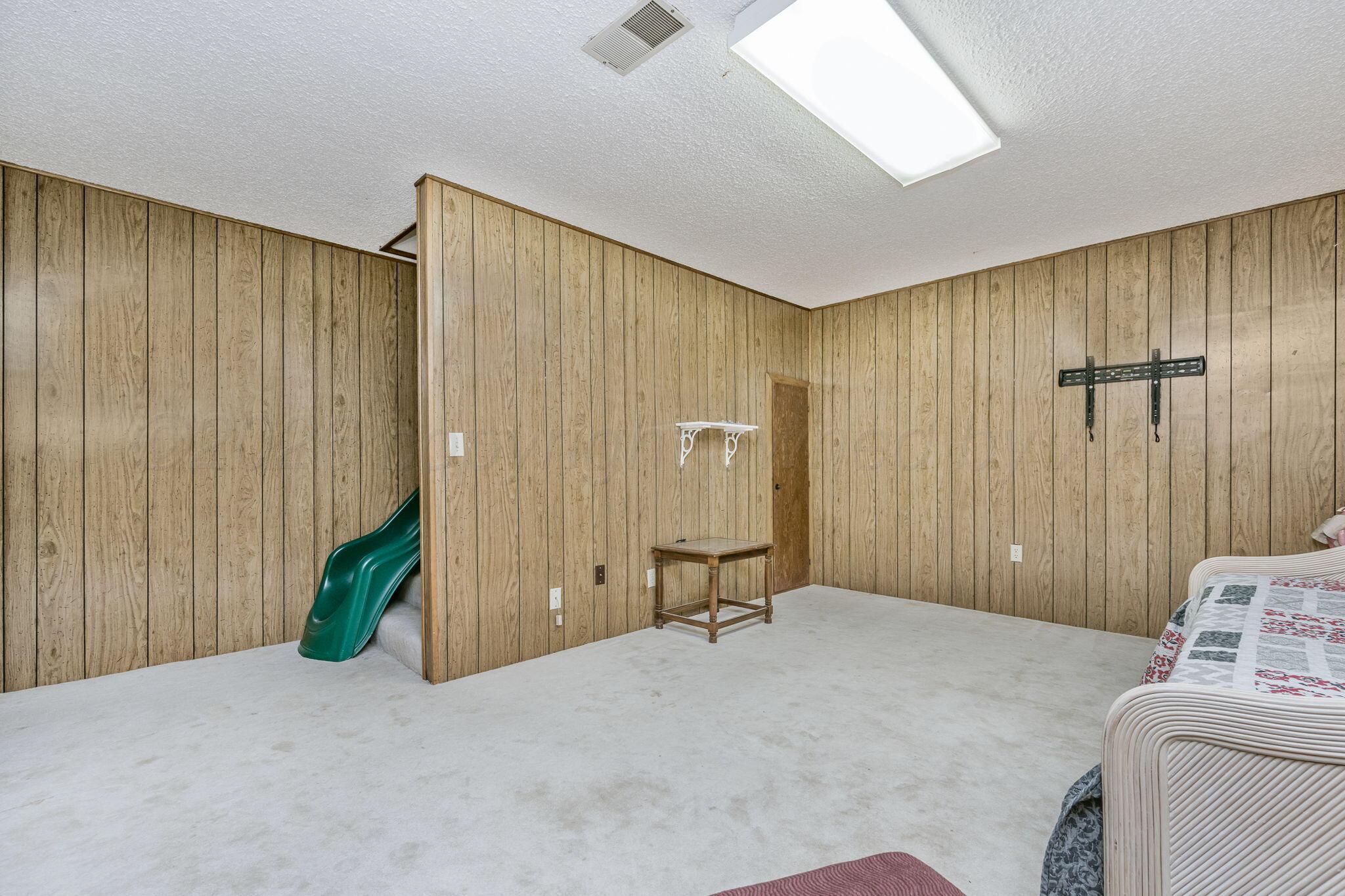 801 Arrah Friona, TX 79035 - Photo 27 of 37 a view of a bedroom with furniture and staircase