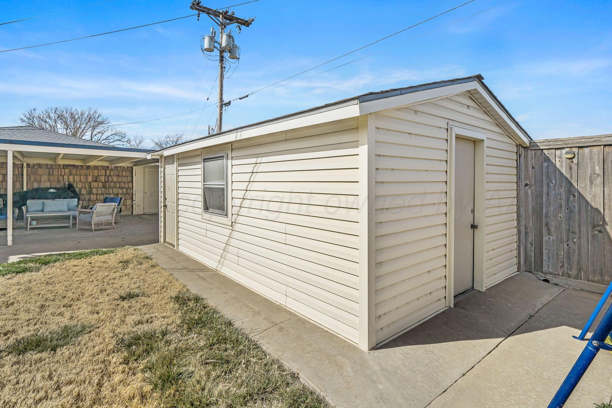 801 Arrah Friona, TX 79035 - Photo 33 of 37 a view of a backyard with a patio
