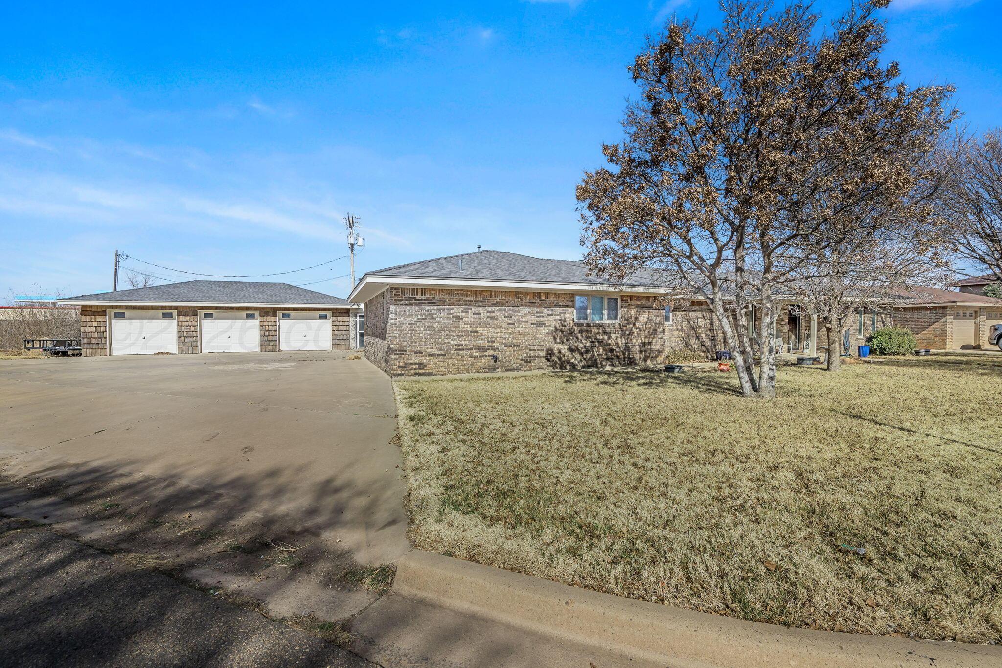 801 Arrah Friona, TX 79035 - Photo 35 of 37 a front view of a house with a yard