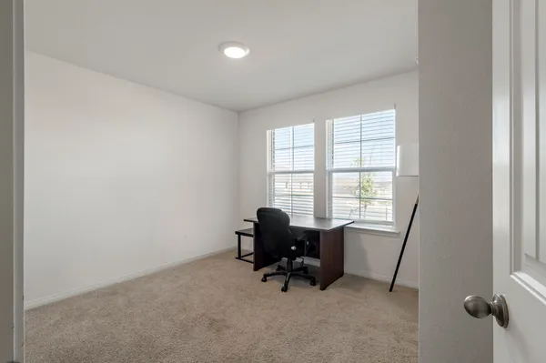 a view of workspace with a window