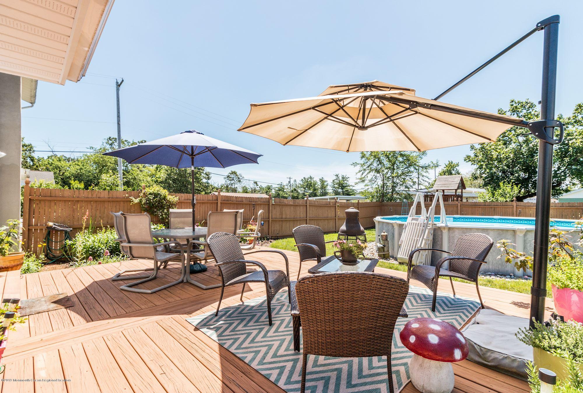 702 Maple Street Lakehurst, NJ 08733 - Photo 15 of 18 Fenced yard surrounded by perennials