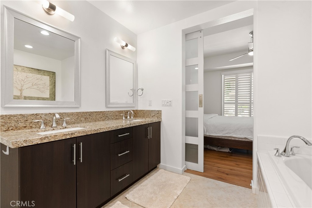 21 Gramercy, Unit 102 Irvine, CA 92612 - Photo 18 of 30 Bright and modern bathroom designed with clean lines and upscale details.