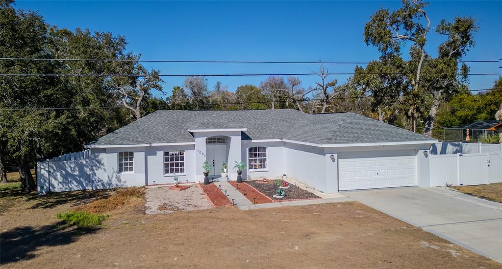 front view of a house with a dry yard
