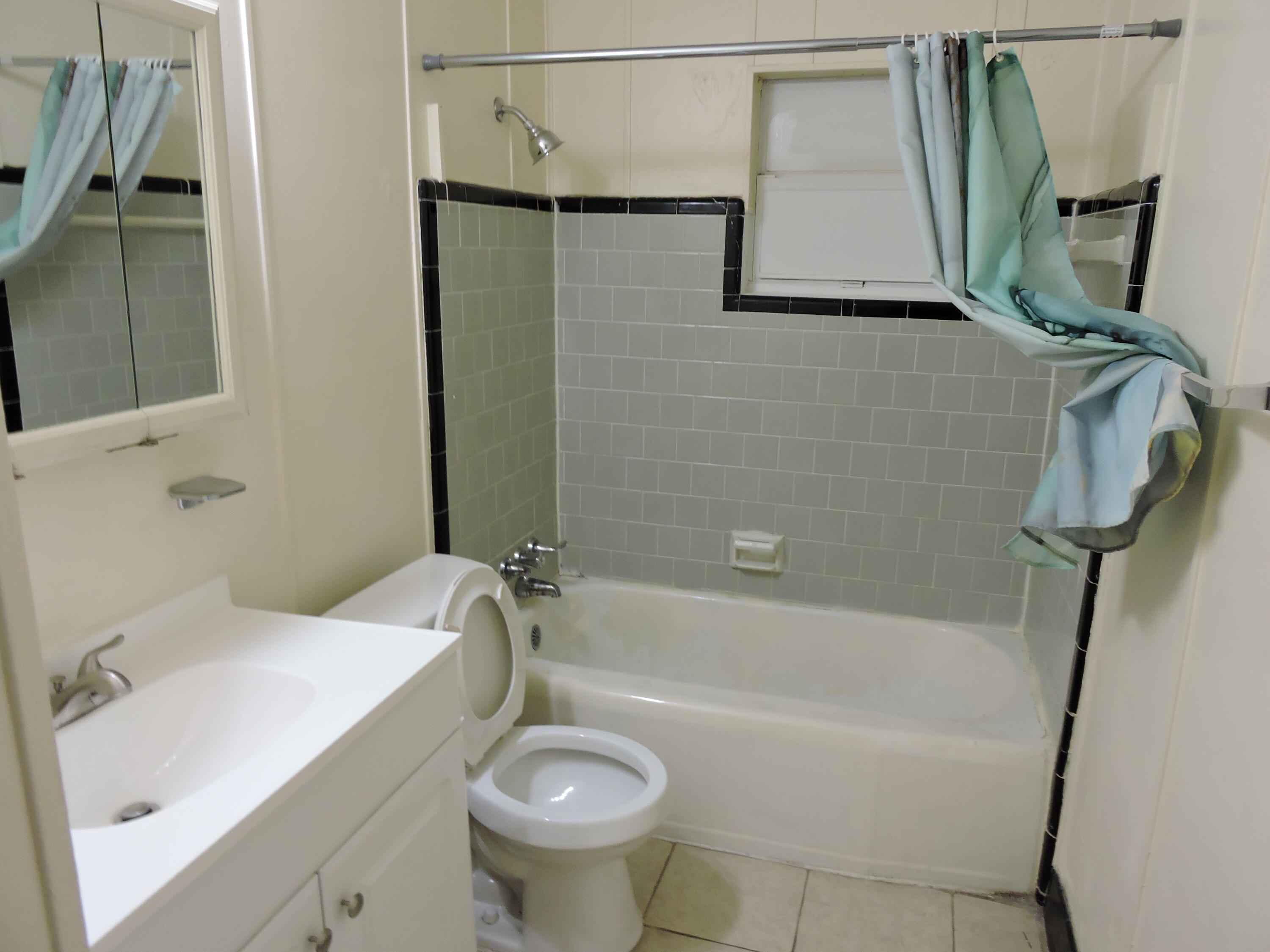 120 Sikes Drive Crestview, FL 32539 - Photo 12 of 18 a bathroom with a sink and a mirror