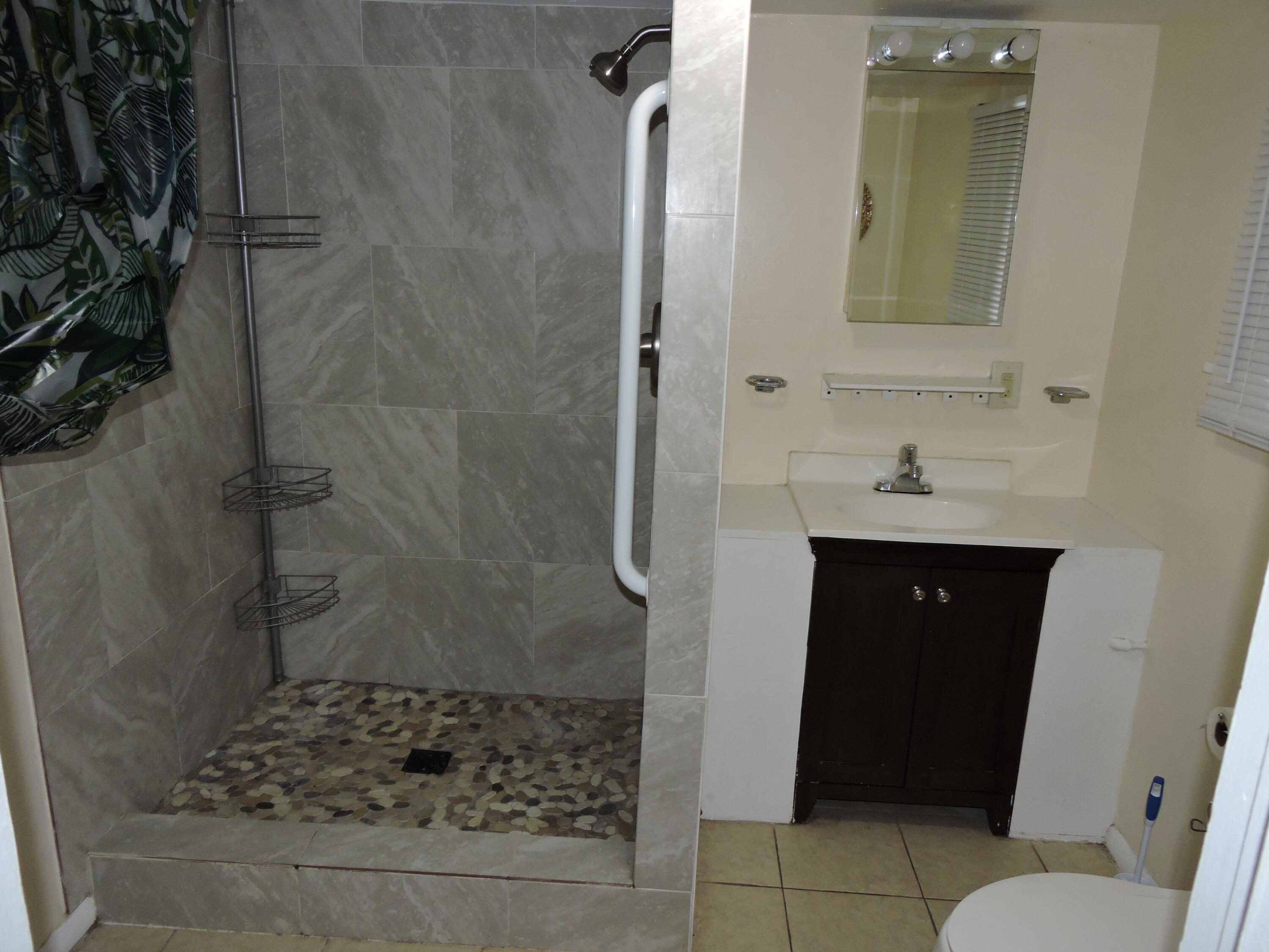 120 Sikes Drive Crestview, FL 32539 - Photo 9 of 18 a bathroom with a sink and a mirror