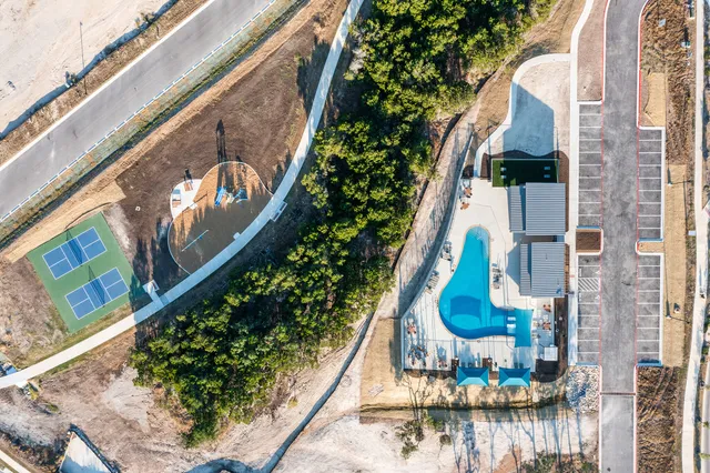 a view of swimming pool with a patio
