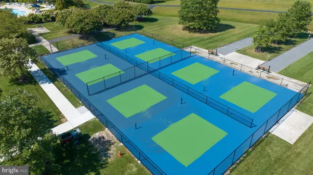 a view of a backyard with green space