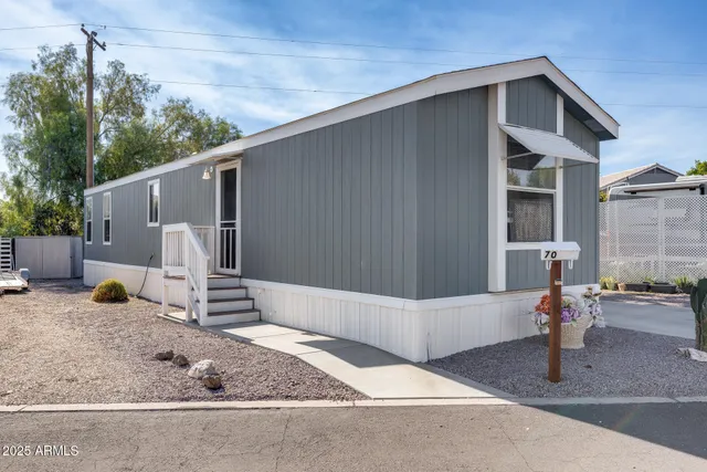 a backyard of a house with seating space
