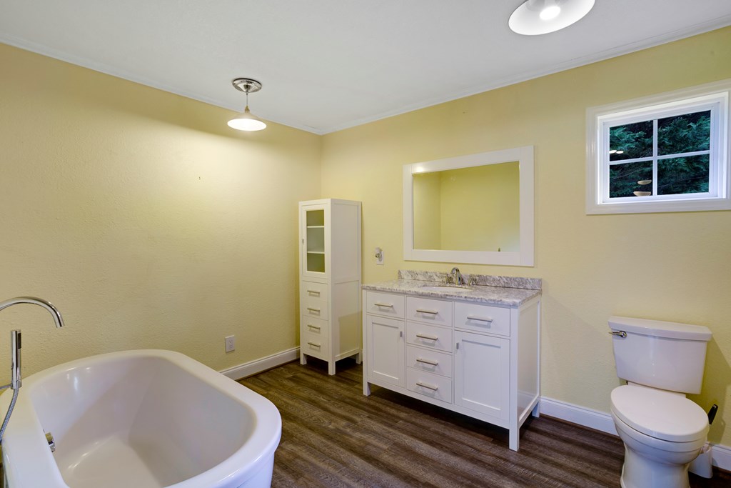 6491 Crooked Creek Road Young Harris, GA 30582 - Photo 33 of 59 a bathroom with a sink and a mirror