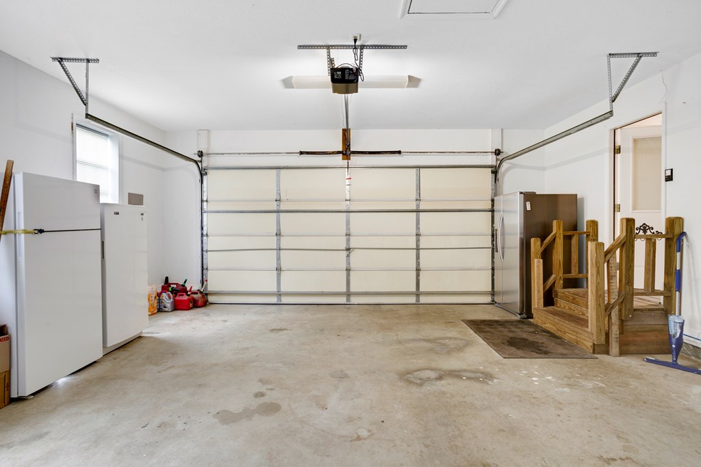 6491 Crooked Creek Road Young Harris, GA 30582 - Photo 39 of 59 a view of a garage with stairs