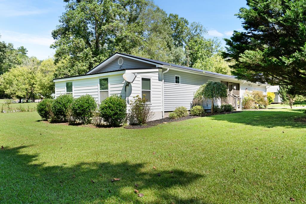 6491 Crooked Creek Road Young Harris, GA 30582 - Photo 50 of 59 a front view of house with yard and green space