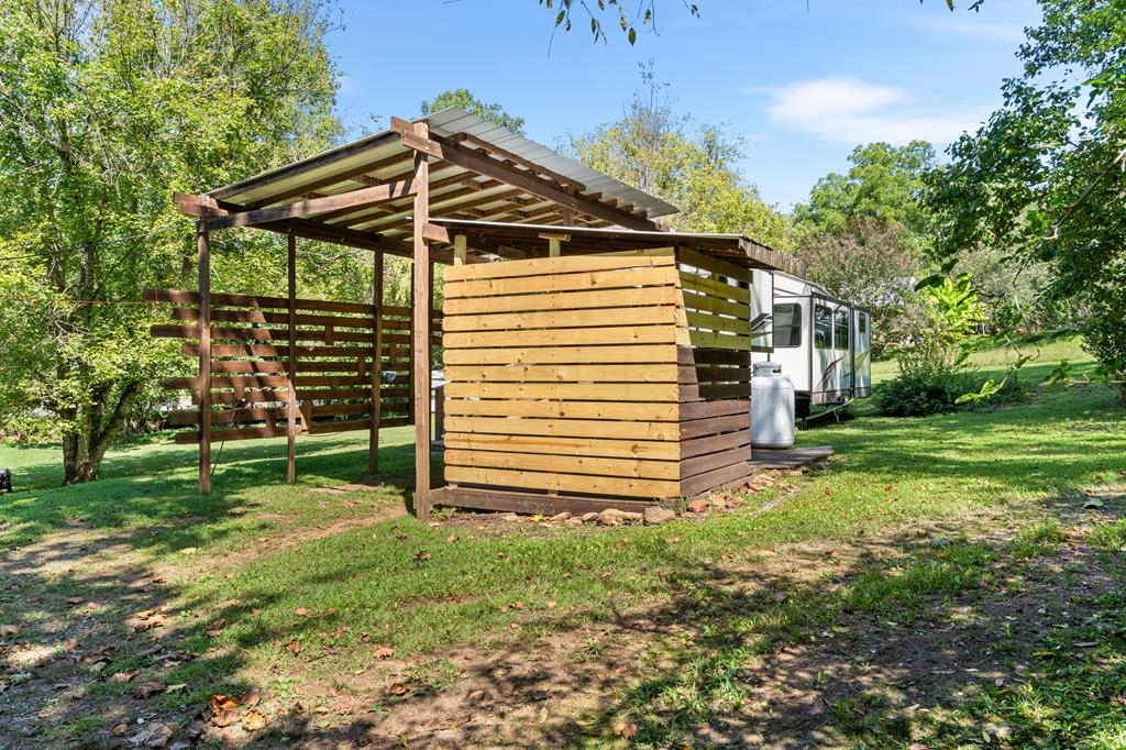 6491 Crooked Creek Road Young Harris, GA 30582 - Photo 53 of 59 a view of a house with a yard