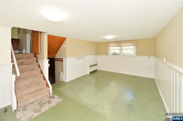 a view of a hallway with staircase