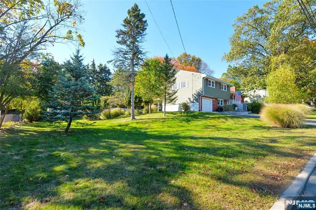a view of a house with a big yard