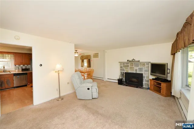 a view of a livingroom with a fireplace