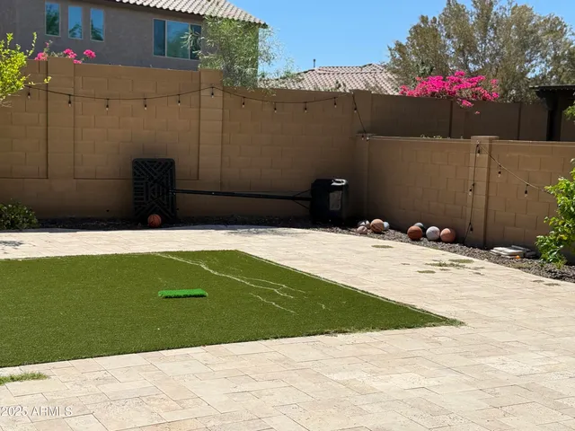 a view of balcony with wooden floor
