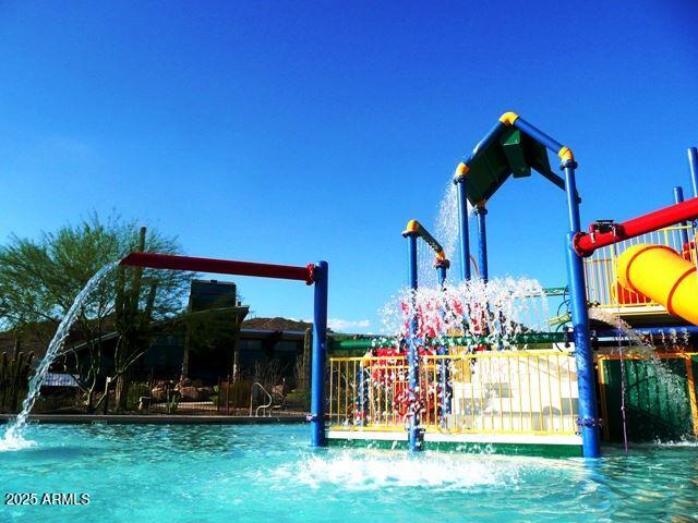1843 West Fetlock Trail Phoenix, AZ 85085 - Photo 29 of 36 a front view of a house with garden