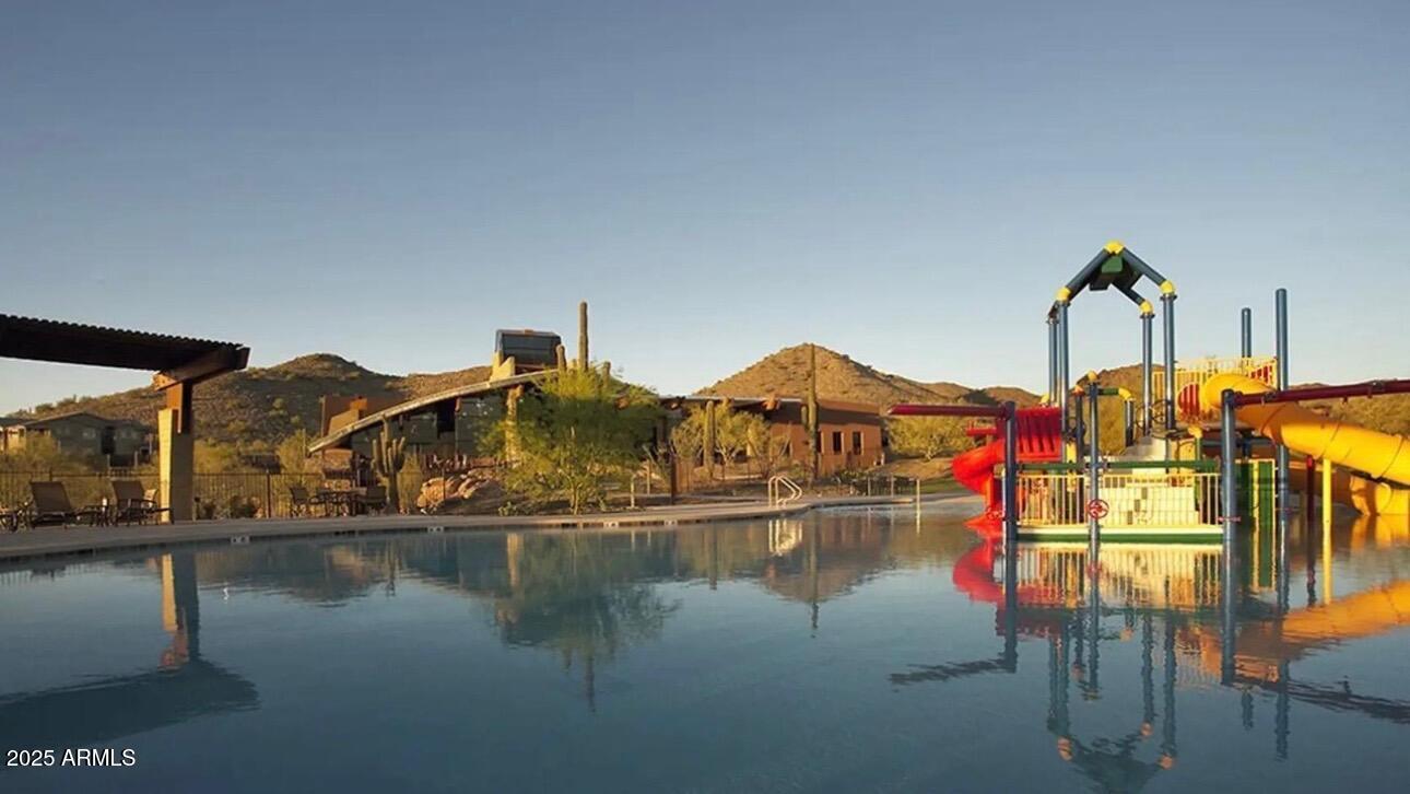 1843 West Fetlock Trail Phoenix, AZ 85085 - Photo 30 of 36 a front view of a house with lake view