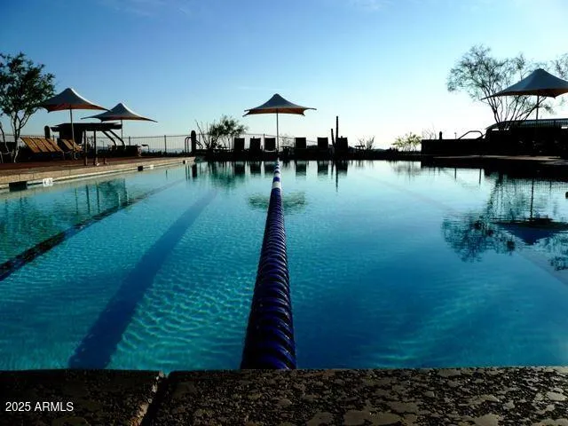 a view of a lake with houses in the background