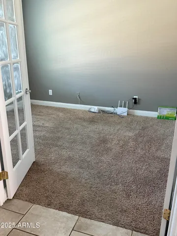 a view of a room with a door