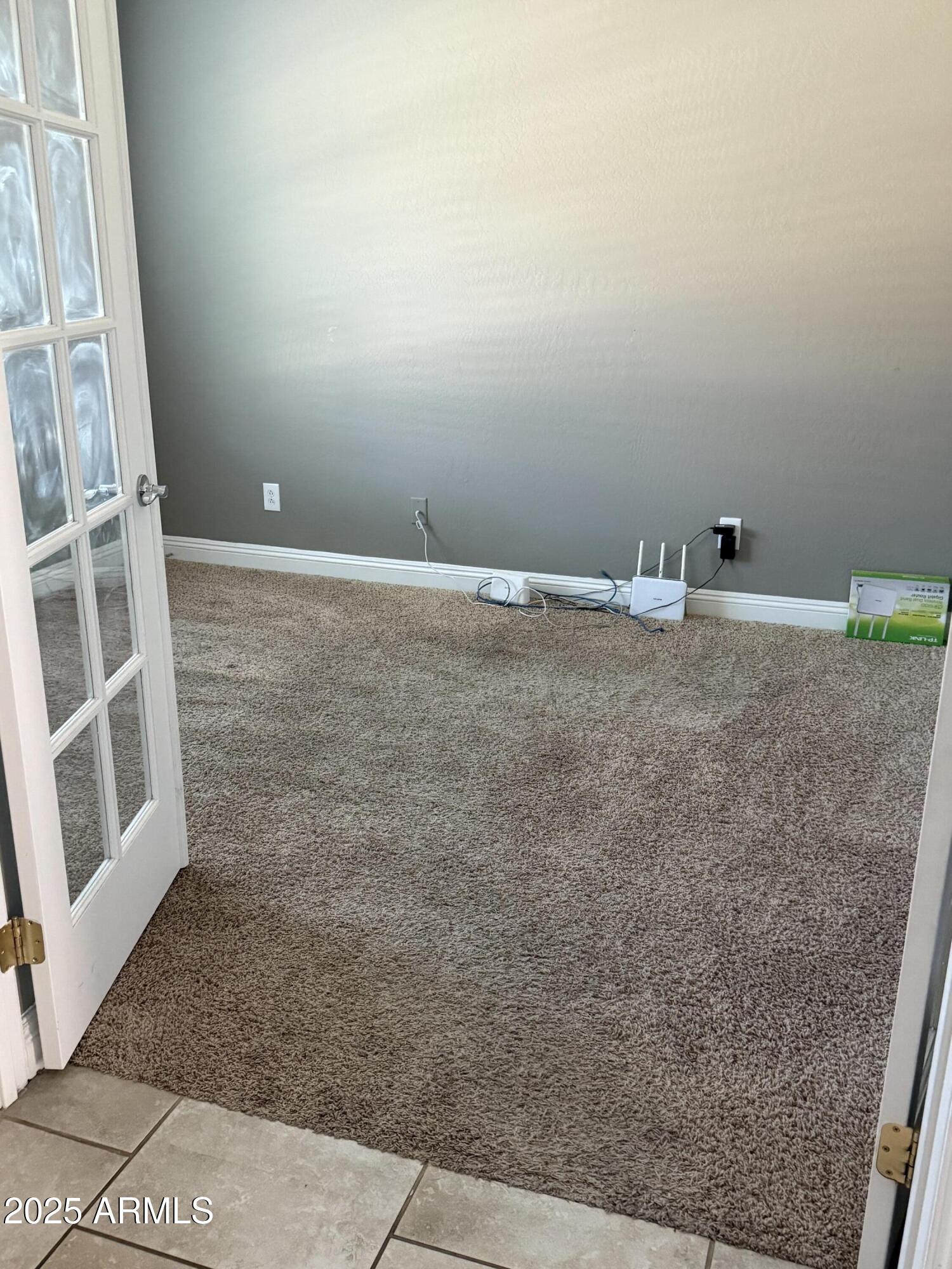 1843 West Fetlock Trail Phoenix, AZ 85085 - Photo 7 of 36 a view of a room with a door