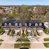 a view of a swimming pool with a yard