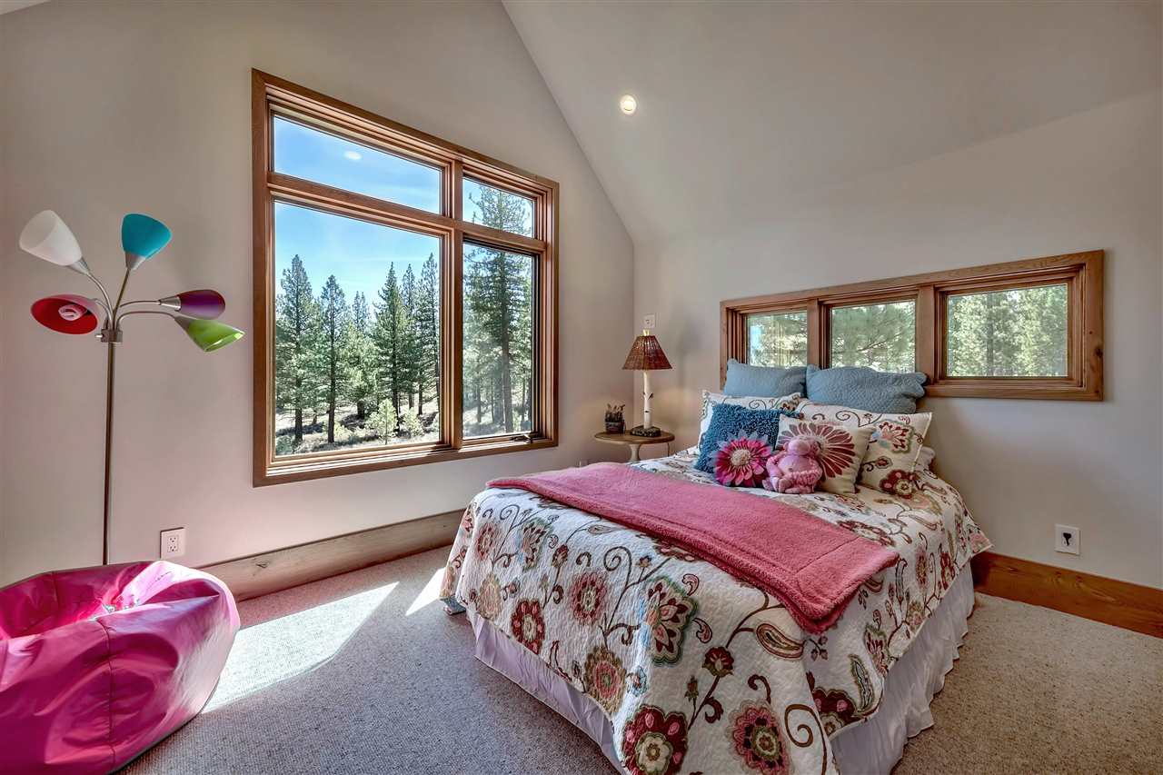 7565 Lahontan Drive Truckee, CA 96161 - Photo 17 of 21 a bedroom with a bed and a window