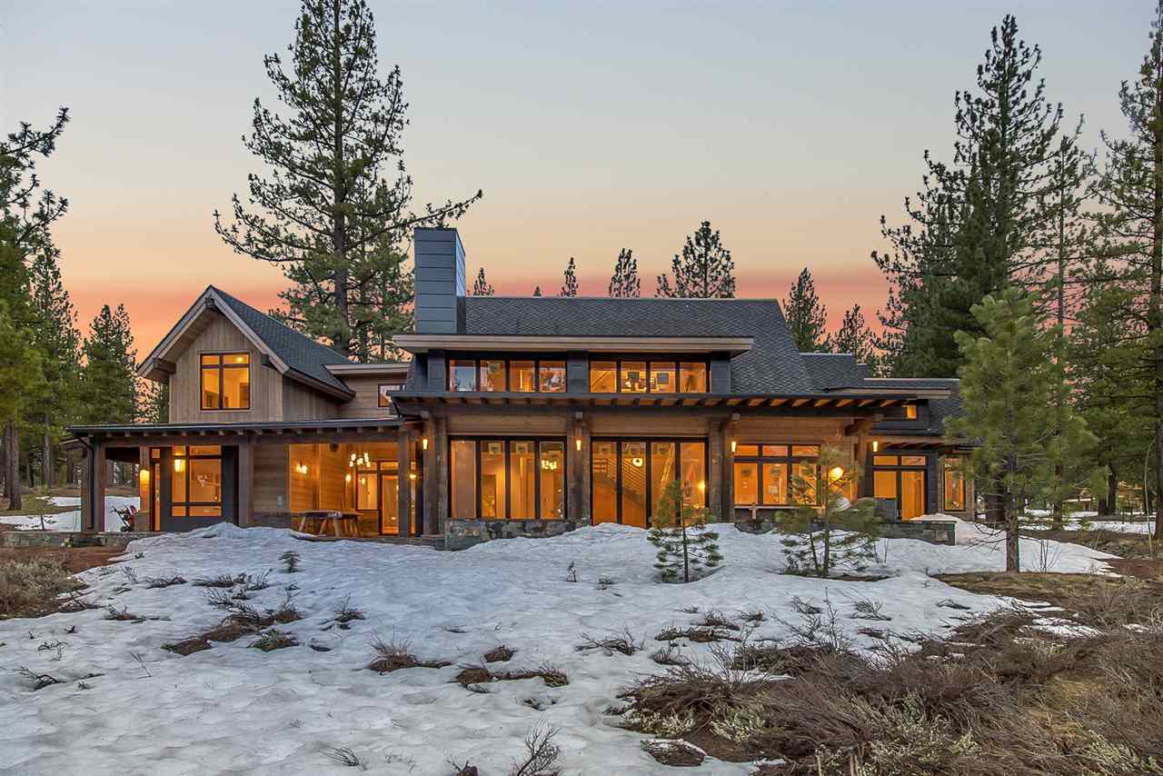 7565 Lahontan Drive Truckee, CA 96161 - Photo 3 of 21 a view of a house with large trees and wooden fence