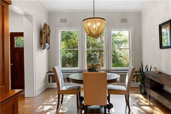 a bedroom with a bed and a table